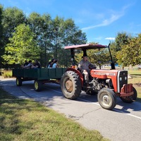 Knightdale residents enjoy a tractor ride at the Fall on First Avenue event in Knightdale, NC