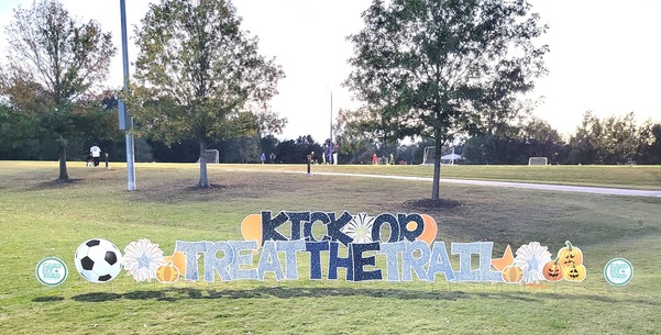 Kick or Treat the Trail sign