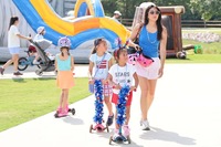 Family walking at Fourth on First Avenue Celebration
