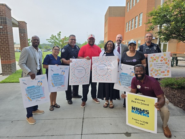 Knightdale Town Staff and Council Members greet students for the first day of school