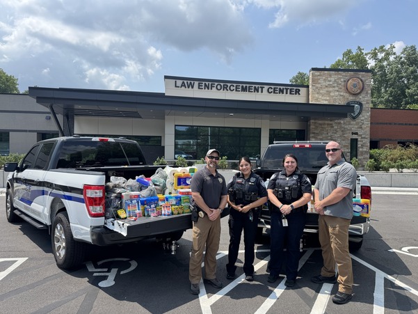 Knightdale Police Participate in Fill The Truck school supply collection event.