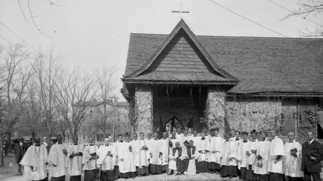 Historic Saint Augustine's Chapel and staff