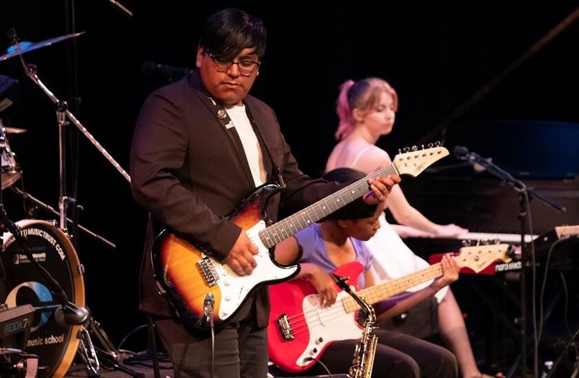 Three Community Music School Student Musicians in Concert, photo by Lanny Ealey