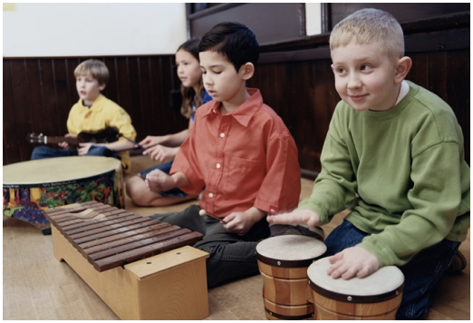 Children playing Orff Instruments