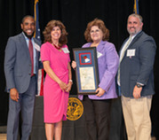 Freda Lee receiving Caswell award