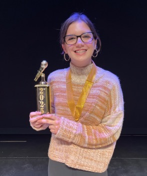 2025 North Carolina Poetry Out Loud champion Anika Ryder poses with trophy