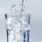 Glass of Water with gray background