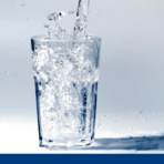 Glass of Water with gray background