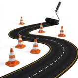 Illustration of a winding road and hazard cones 