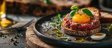 Picture of steak tartare with raw quail egg