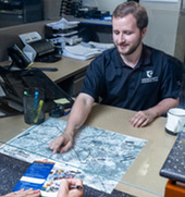 Environmental Health Specialist Assisting Customer