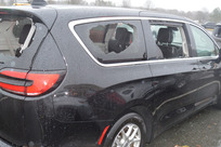 March 5 tornado damage on vehicle with windows blown out