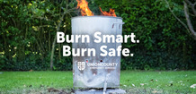 Burn Smart. Burn Safe. graphic with fire barrel and Union County Emergency Services logo