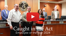 Screenshot of video for caught in the act of the year award with a play button