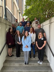 new employee group photo April 2025