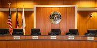 empty dais in board room at government center
