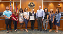 Finance receiving award from BOCC