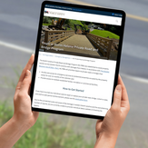 Tablet displaying the Tropical Storm Helene Private Road and Bridge Program