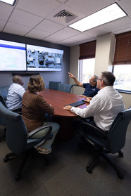 GIS team seated around a table