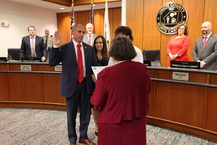 County Commissioner Errol Wedra taking the oath of office.