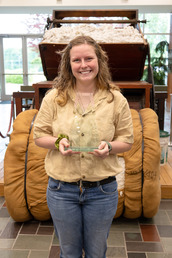 Autumn Baucom holding Lifesaver Award