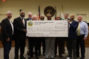 Legislators with big check