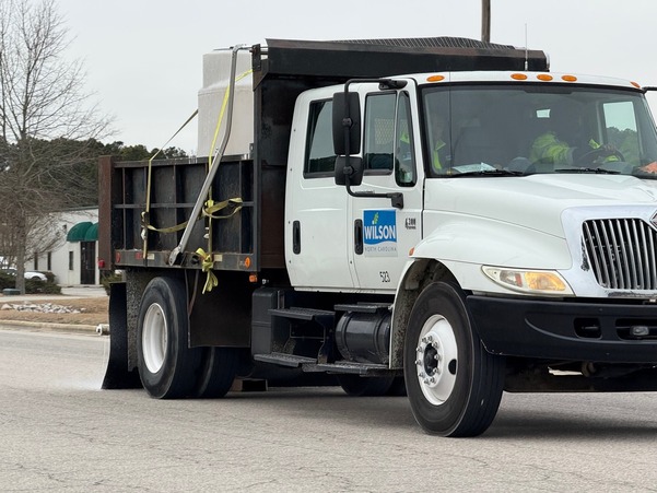 truck pretreating streets