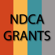 NDCA Grants with four color bars in the background