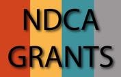 NDCA Grants with four color bars in the background