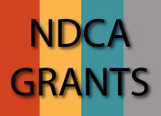 NDCA Grants with four color bars in the background