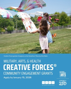 Two girls outdoors hanging up colorful art on a clothesline. Ad for "Creative Forces" grants due Jan 15, 2026.
