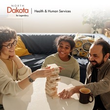 caucasion male and female with teenager playing a game