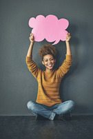 woman holding chat bubble