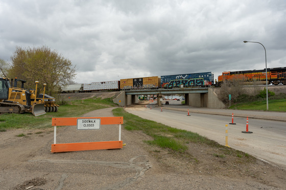 Closed pedestrian path at the railroad underpass on Memorial Highway as crews make barrier wall improvements. 