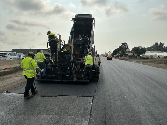 Photo of crews paving at the Memorial Highway Phase 2 project in Mandan, North Dakota.