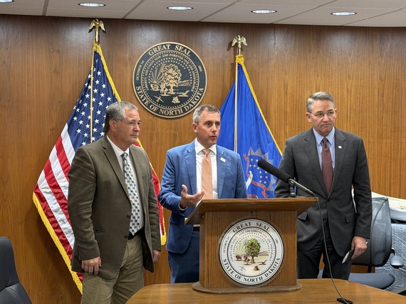 Governor Kelly Armstrong, Agriculture Commissioner Doug Goehring and Attorney General Drew Wrigley speak to media at the Capitol