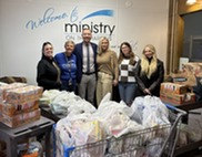 Governor's Office staff donating food at Ministry on the Margins in Bismarck