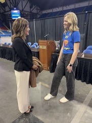 Lt. Gov. Michelle Strinden speaks with a student at Fill the Dome