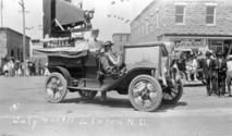 Smith's Photo Studio parade float, Linton, N.D., 1911. Click to go to https://digitalhorizonsonline.org/digital/collection/p16921coll1/id/13995/