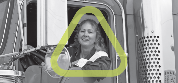 Black and white photo of woman in semi truck leaning out and smiling. Green Get Home Safe triangle surrounds her face.