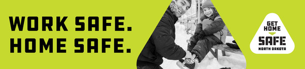 Dad and young boy smiling, lacing up ice skates