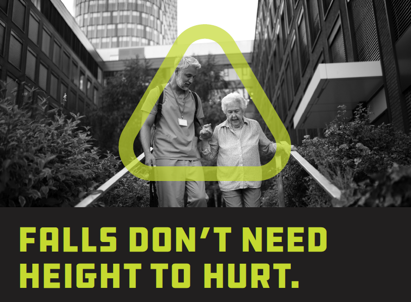 Graphic with words "Falls don't need height to hurt." and photo of a man holding the hand of an older woman while walking down the stairs.