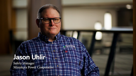Jason Uhlir sits facing the camera