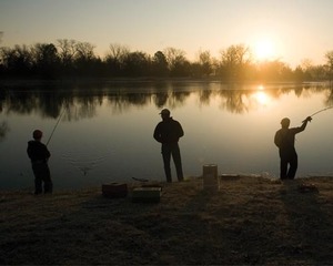 Anglers at sunset
