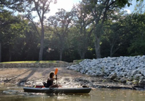 A woman kayaking on the Platte