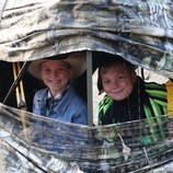 Two boys in a hunting blind