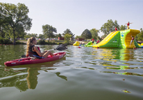 A lifeguard watching the floating playground at Louisville State Recreation Area