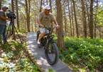Dave Burch rides the trails at Platte River State Park for the reality show.