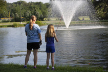 Mother and daughter fishing at Halleck Lake in Papillion