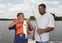 Father and son fishing together